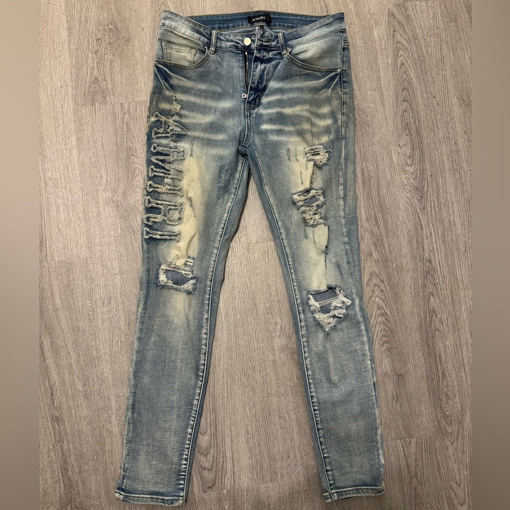 AMIRI Distressed Light Blue Slim Jeans